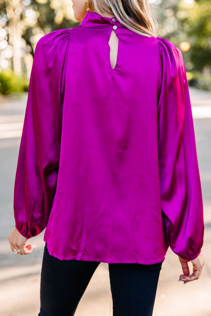 Embrace they joy that this blouse is going to bring! That satin fabric is so luxurious especially with that draped neckline! This bubble sleeve blouse is going to look amazing at the office or a nice restaurant! Cowl neckline Button keyhole back Long bubble sleeves Satin fabric No stretch Cam is wearing the small. Feminine Bishop Sleeve Party Tops, Silk Long Sleeve Blouse For Date Night, Elegant Tops For Night Out With Balloon Sleeves, Fall Date Night Blouse With Blouson Sleeves, Feminine Party Blouse With Bishop Sleeves, Feminine Bishop Sleeve Party Blouse, Elegant Lantern Sleeve Tops For Night Out, Elegant Balloon Sleeve Blouse For Night Out, Elegant Puff Sleeve Tops For Date Night