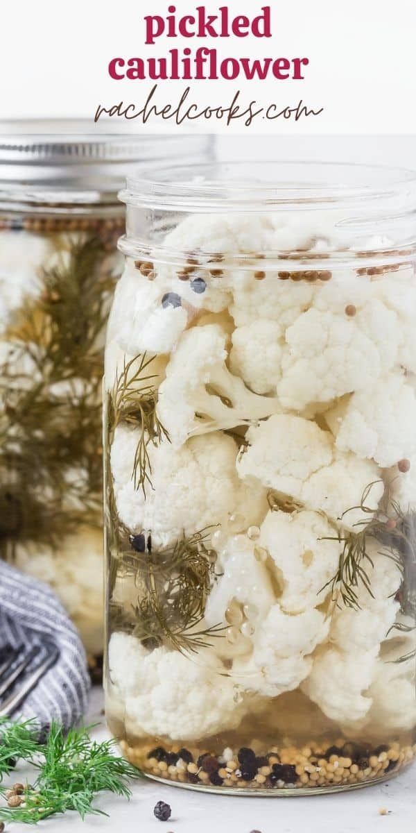 a jar filled with cauliflower sitting on top of a table