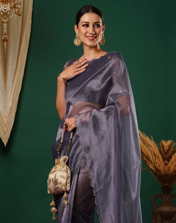 Mauve Embroidery Plain Net Saree  Mauve Embroidery Plain Net Saree is a delicate and feminine piece. The sheer net fabric drapes beautifully, creating a flowing and ethereal look. The plain net base provides a clean and minimalist backdrop for the intricate embroidery, which can feature floral motifs, geometric patterns, or abstract designs.  Features Of Mauve Embroidery Plain Net Saree  Traditional Handloom Craft  Intricate Gold Brocade Work  Durability and Longevity   Size Fit  The model heigh Elegant Organza Blouse Piece For Diwali, Anarkali Net Blouse Piece For Eid, Bollywood Style Organza Pre-draped Saree With Sheer Dupatta, Organza Pre-draped Saree With Sheer Dupatta, Eid Saree With Self Design In Net, Elegant Organza Blouse Piece With Sheer Dupatta, Eid Net Saree With Self Design, Eid Self Design Net Saree, Eid Self-design Net Saree