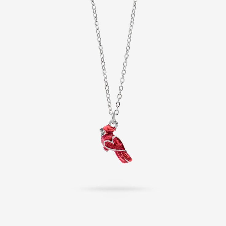 Sometimes the memory of a loved one can strike us out of the blue. Our beautiful Messenger from Heaven Necklace makes a loving memento to a soul worth treasuring, with its lustrous red cardinal charm and subtle heart detail. 16” chain with 2” extender Available in 18kt gold plated and silver plated finish Cardinal charm Packaged in a gift box and includes an essence card Red Jewelry With Adjustable Chain For Anniversary, Red Charm Necklace With Adjustable Chain As A Gift, Red Jewelry For Valentine's Day Keepsake, Red Jewelry With Lobster Clasp For Anniversary, Red Charm Necklace With Adjustable Chain For Gift, Personalized Red Jewelry For Keepsake, Personalized Red Sterling Silver Necklace, Personalized Red Keepsake Jewelry, Red Pendant Necklace For Keepsake