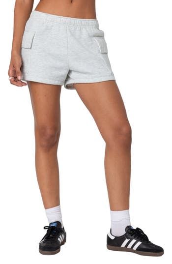 Soft cotton fleece adds cozy comfort to these relaxed shorts popped with on-trend cargo pockets for an ultracool look. Elastic waist Cargo flap-patch pockets 100% cotton Machine wash, dry flat Imported Cotton Athletic Shorts With Pockets For Leisure, Leisure Cotton Athletic Shorts With Pockets, Cotton Athletic Shorts With Pockets, Comfortable Cotton Athletic Shorts With Pockets, Relaxed Fit Cotton Athletic Shorts With Pockets, Relaxed Fit Athletic Shorts With Pockets For Streetwear, Sporty Cotton Cargo Shorts With Built-in Shorts, Gray Cotton Cargo Shorts, Sporty Bottoms With Patch Pockets