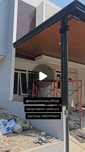 an image of a house being built with metal frame and roofing on the outside