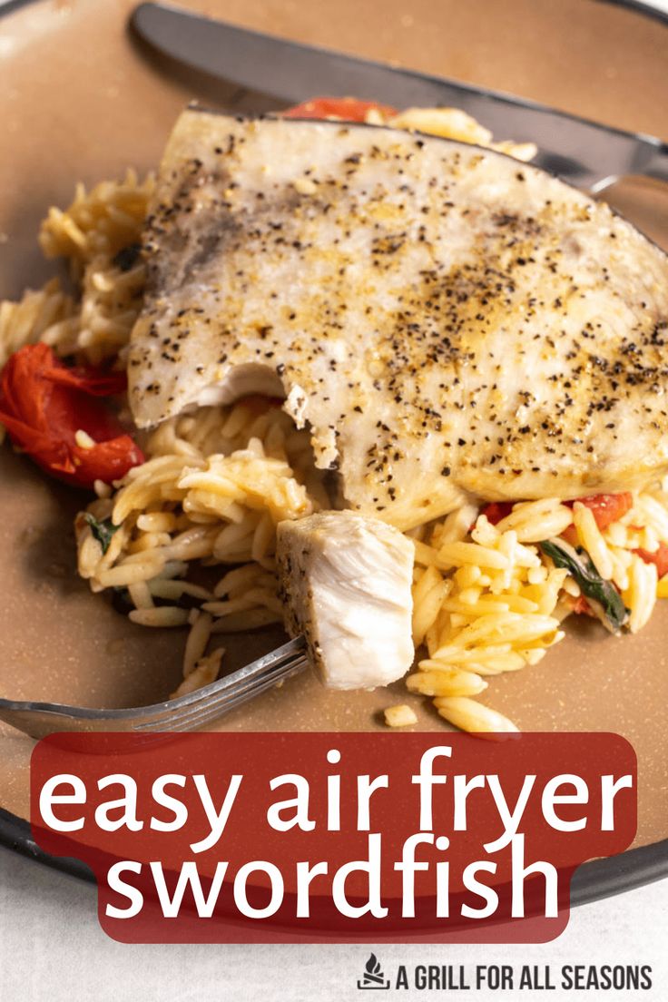 an easy air fryer swordfish recipe on a brown plate with fork and knife