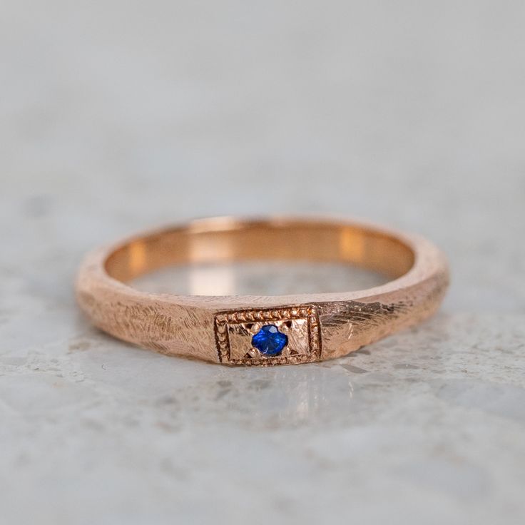 Our Apollo Ruins Stacking Ring has been set with a blue sapphire. Sapphire measures 1.75mm. Band width 1.5- 2mm approx. Weight 2.4g approx. Pictured with a high shine finish. For a matte finish please leave a note at checkout. 14k Gold Sapphire Birthstone Promise Ring, Stackable Sapphire Ring For Promise, Rose Gold Sapphire Promise Ring With Birthstone, 14k Sapphire Promise Ring, Rose Gold 14k Sapphire Promise Ring, Stacking Ring, Stacking Rings, Trinidad And Tobago, Promise Rings