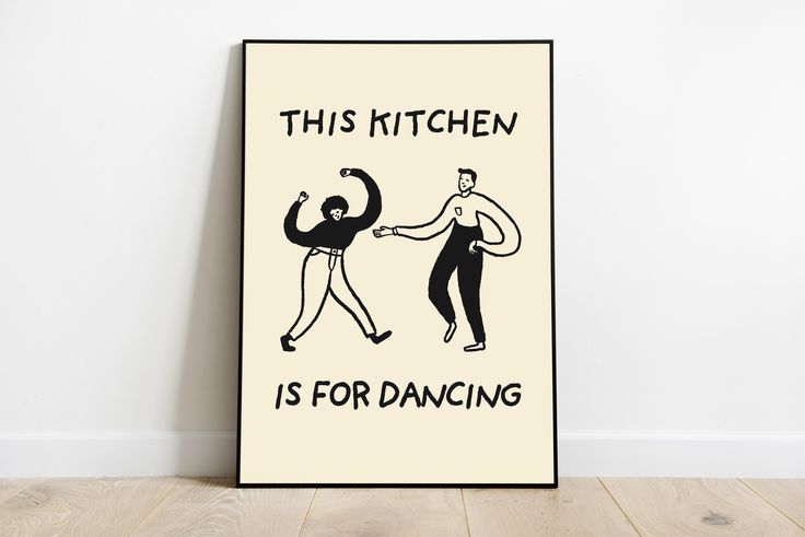 this kitchen is for dancing poster hangs on the wall in front of a wooden floor