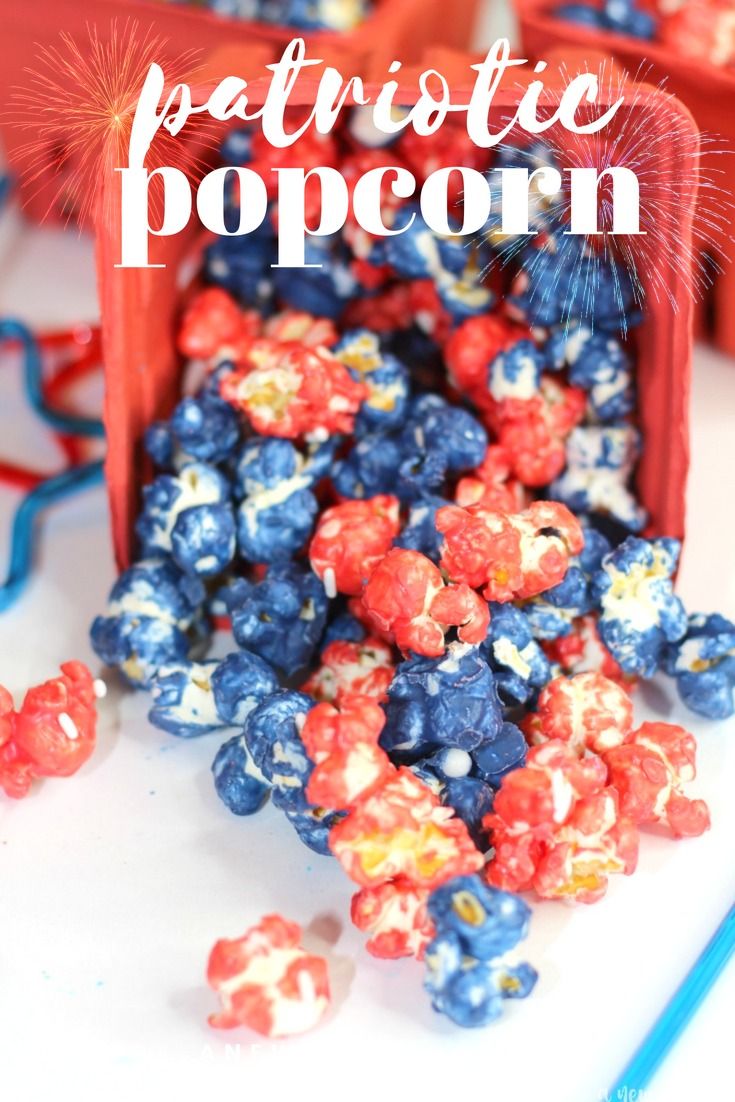 red, white and blue popcorn with fireworks in the background that says patriotic popcorn on it