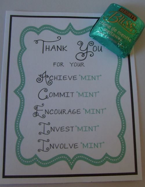 a thank you note with a candy bar on top