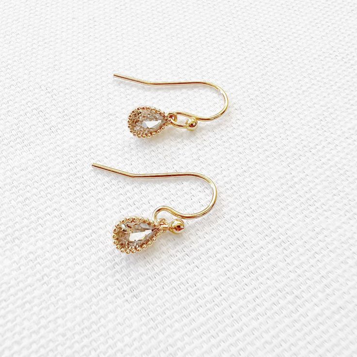 A classic go-to staple for any occasion. Perfect for day to night and everything in between. Lightweight. Size: 3/4” 8-9mm genuine AAA freshwater pearls 14k gold filled earrings Each natural pearl is unique and therefore no two are alike. Pearls, colors and sizes may vary Lead & nickel free Hypoallergenic Handmade with the highest standards & quality materials Includes 100% organic cotton jewelry pouch This item is handmade and shipped with love from our studio located in West Chester, PA. *Clic Gold Delicate Hypoallergenic Pearl Earrings, Elegant 14k Yellow Gold Filled Teardrop Earrings, Everyday Gold Hypoallergenic Pearl Earrings, Everyday Gold Pearl Hypoallergenic Earrings, Hypoallergenic 14k Gold Filled Earrings For Anniversary, Everyday Hypoallergenic Gold Pearl Earrings, Gold Pearl Earrings With 14k Ear Wire, Gold 14k Gold Pearl Earrings With Ear Wire, 14k Gold Hypoallergenic Drop Pearl Earrings