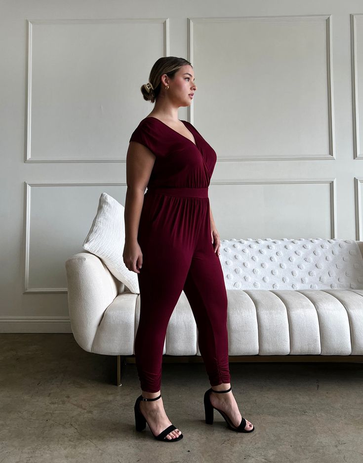 The Curve Knit Sleeveless Jumpsuit is perfect for a night out with friends or a date night. Pair this plus size jumpsuit with a leather jacket and some heels for an edgy look, or make it a bit more casual with a jean jacket. This jumpsuit features two hip pockets, long sleeves, ruching at the waist and ankles, and surpliced, v-shaped necklines in both the front and the back. It is a step-in jumpsuit, with no zippers or buttons. The material is a stretchy knit. This jumpsuit is made from 96% rayo Plus Size Jumpsuit, Edgy Look, Sleeveless Jumpsuits, V Shape, Jean Jacket, Date Night, Night Out, Jumpsuit, Leather Jacket