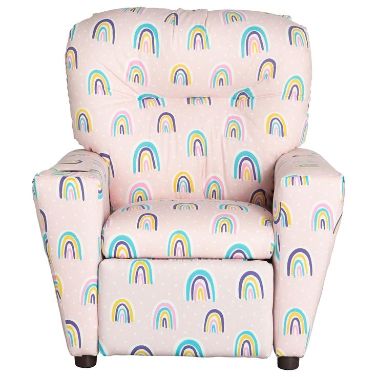 a child's recliner with rainbows and dots on the back, in pink