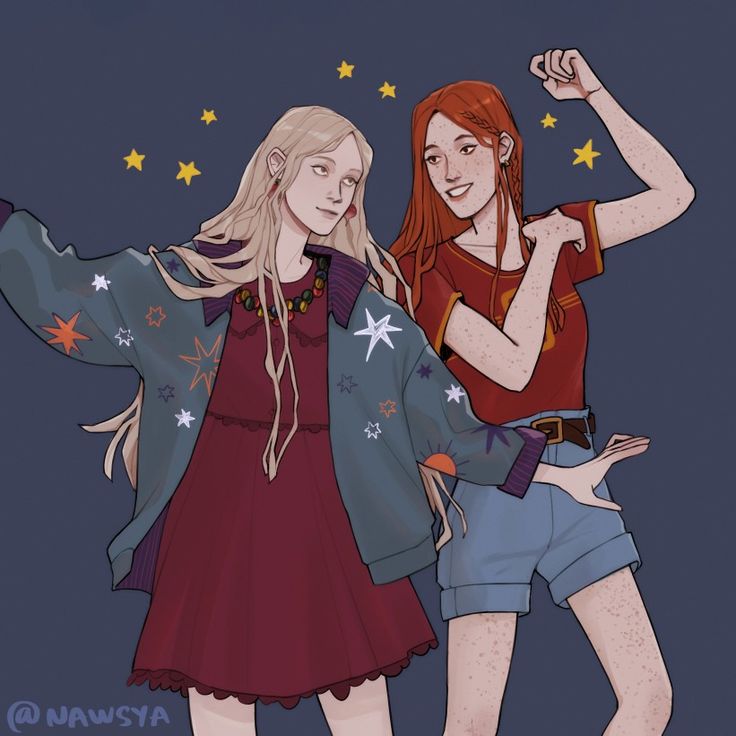 two young women standing next to each other with stars on their shoulders and arms in the air