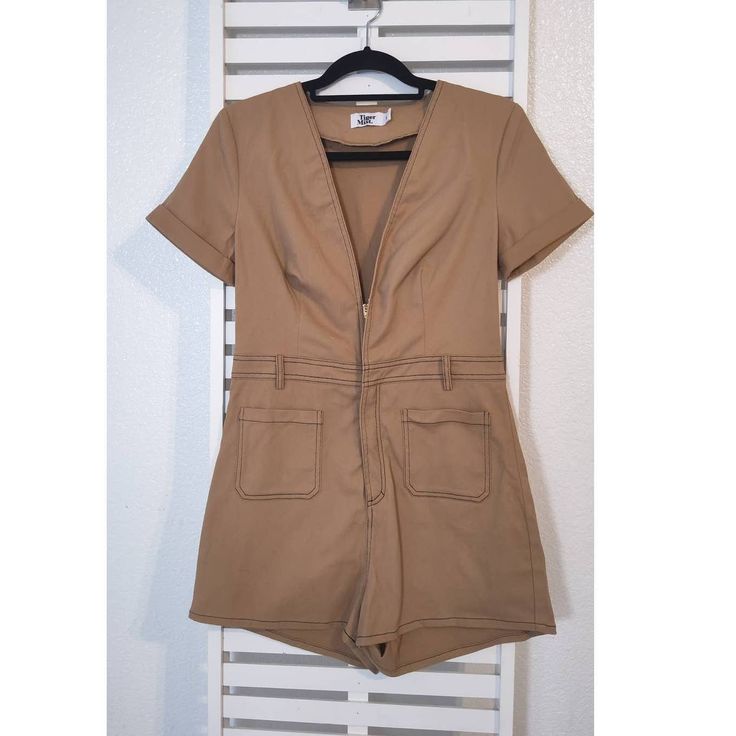 Tiger Mist Dakota Short Sleeve Romper Size L Nwot! This Is New,Had Zipper Repair Done, Never Been Used, In Great Condition Armpit To Armpit 17.5" Waist 15" Flat Fitted Jumpsuits And Rompers With Pockets, Fitted Short-length Jumpsuits And Rompers With Pockets, Fitted Brown Jumpsuit With Short Sleeves, Brown Fitted Jumpsuit With Short Sleeves, Brown Fitted Short Sleeve Jumpsuit, Fitted Brown Short Sleeve Jumpsuit, Brown Fitted Short-sleeve Jumpsuit, Jumpsuit Shorts, Zipper Repair