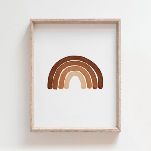 a wooden frame with a brown and tan rainbow in it on the wall next to a white wall