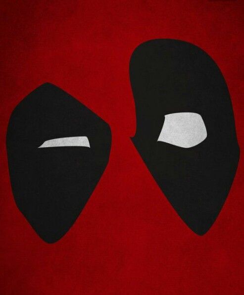 a red background with two black masks on it