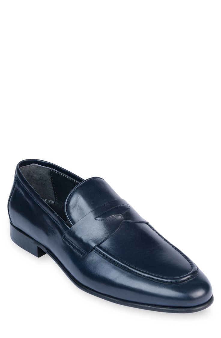 Handmade of smooth leather, this moc-toe dress shoe with a classic penny loafer silhouette offers a sophisticated, elegant look. Leather upper and lining/synthetic sole Made in Turkey Classic Blue Loafers For Work, Elegant Blue Moccasins For Business, Blue Business Dress Shoes With Removable Insole, Blue Almond Toe Moccasins For Formal Occasions, Elegant Blue Loafers For Formal Occasion, Blue Almond Toe Formal Moccasins, Classic Blue Leather Shoes With Removable Insole, Blue Wingtip Moccasins For Business, Blue Moc Toe Leather Shoes For Business