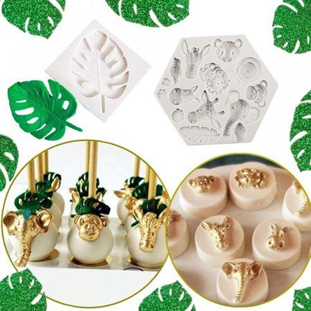 some green leaves and white vases with gold decorations