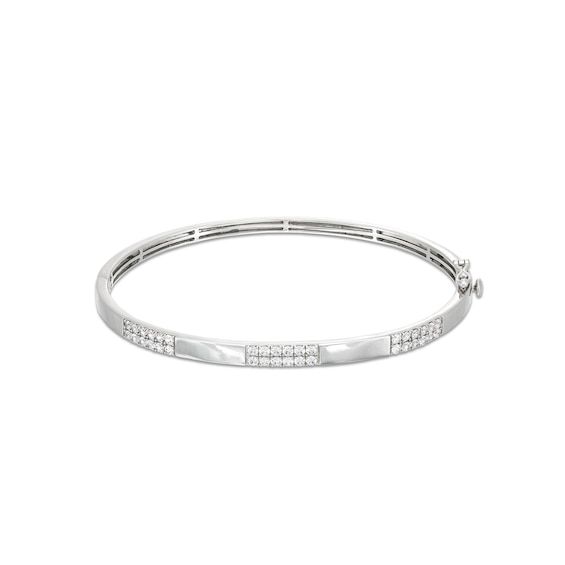 Redefine classic with the sleek and sparkling look of this certified diamond double-row bangle bracelet in white gold. Created in 14K white gold Double rows of certified diamonds - boasting a color rank of H and clarity of I1 - are stationed along the polished band. Looks great solo or layered with other bracelets Radiant with 1 ct. t.w. of diamonds Includes certification card This hinged bangle secures with a tongue and groove clasp. Modern White Gold Diamond Bracelet Channel Set, Modern Channel Set Diamond Bracelet In White Gold, White Gold Channel Set Diamond Bangle, White Gold Channel Set Diamond Bangle Bracelet, Elegant White Gold Bangle With Channel Set, Channel Set White Gold Diamond Bangle Bracelet, Elegant White Gold Channel Set Bangle, Channel Set Diamond Bangle In White Gold, Classic Formal Bangle With Channel Set