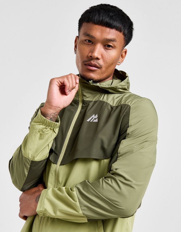 Layer up and take on the terrain with this men's Breeze Windbreaker Jacket from Montirex. In a Khaki Green colour block design, this JD-exclusive jacket is made from lightweight ripstop fabric for durability, with vented panels to the front and back for cool comfort. It features an adjustable hood, elasticated cuffs and a full zip fastening on the front. Finished off with zip-fasten side pockets and reflective Montirex branding on the chest and down the back. Machine washable. | Our model is 6'0" with a 40" chest and wears a size medium. Ripstop Fabric, Green Colour, Jd Sports, Block Design, Colour Block, Khaki Green, Windbreaker Jacket, Color Blocking, Branding