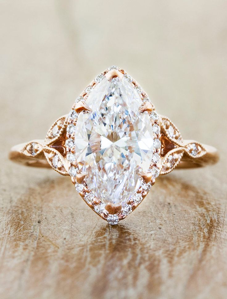 caption:Shown with a 2ct marquise diamond Marquise Engagement Ring Halo, Expensive Wedding Rings, Wedding Ring Diamond Band, Rose Gold Diamond Ring Engagement, Antique Engagement Ring, Ice Water, Dream Engagement Rings, Marquise Cut Diamond, Ring Ideas