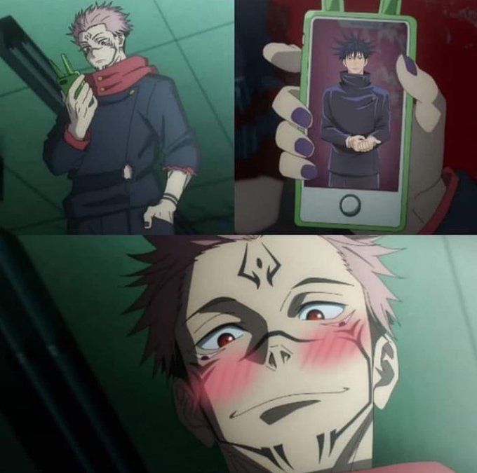 an anime character holding up a cell phone to take a selfie with his face