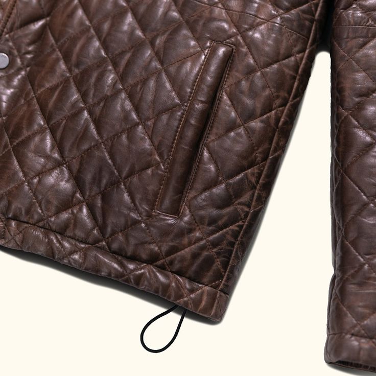 Quilted Jacket Collection In Collaboration with Jack Andrews Vintage Leather Luxury Brand We are excited to bring in this collaboration with Jack Andrews—a new brand in the vintage leather luxury space. Perfectly sophisticated, but not too stuffy. Details in all the right places. In the spirit of the rugged Scottish Highlands, where whispers of ancient tales still echo through the mist-kissed glens, we've crafted a jacket that encapsulates the essence of old-world luxury and timeless sophisticat Luxury Brown Leather Jacket With Pockets, Brown Leather Outerwear With Padded Collar, Brown Luxury Leather Outerwear, Luxury Brown Leather Outerwear, Classic Quilted Leather Jacket, Luxury Brown Leather Jacket For Fall, Rugged Gentleman, Quilted Leather Jacket, Heavy Clothing