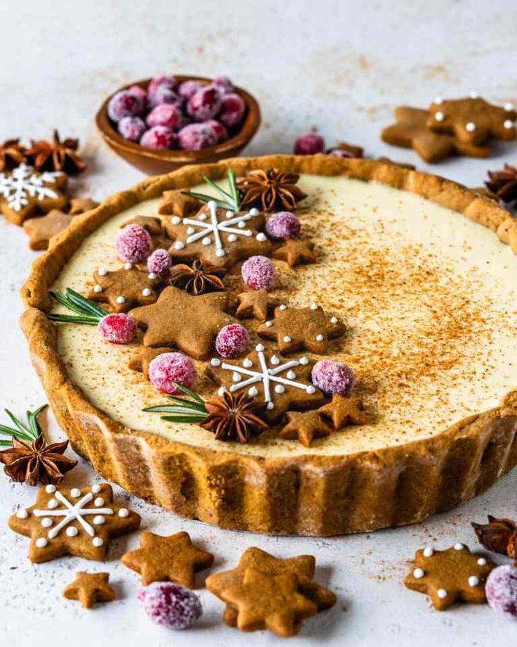 an image of a pie with cookies and other decorations on the top crust for decoration