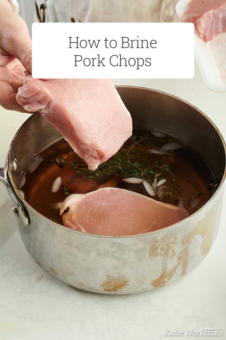 someone is cooking pork chops in a pot