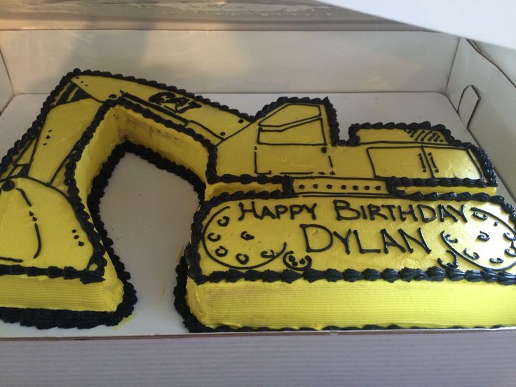 a birthday cake in the shape of a construction vehicle