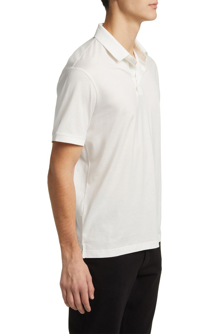 Classic and comfortable, this polo enriched with soft cotton makes a great choice for everyday and always keeps you looking smart. 27" length (size Medium) Button half-placket Spread collar Short sleeves 70% lyocell, 30% cotton Machine wash, line dry Imported Elegant Cotton Polo Shirt With Spread Collar, Elegant Cotton Polo Shirt With Seamless Collar, Classic Everyday Polo Shirt With Polo Collar, Classic Polo Shirt With Placket, Classic White Polo Shirt For Business Casual, Elegant Cotton Polo Shirt For Business Casual, Classic White Polo Shirt For Everyday, Formal Cotton Polo Shirt With Button Closure, Formal Cotton Polo Shirt With Johnny Collar