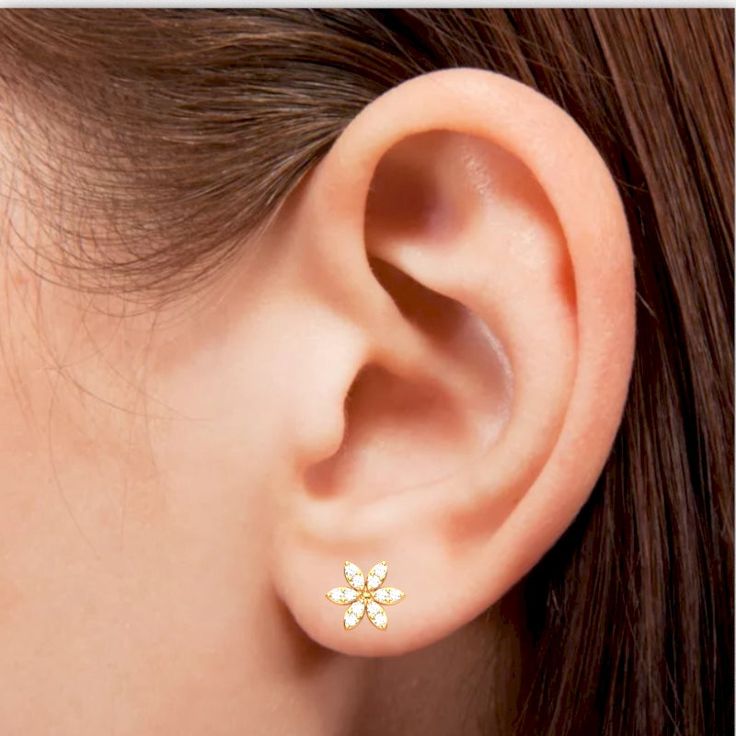 Diamond encrusted flower earrings crafted in solid 14k yellow gold. Diamonds thought to provide the wearer with better relationships and an increase in inner strength. Wearing diamonds is purported to bring other benefits such as balance, clarity and abundance. Genuine Diamonds: .2 carats Qty: 24 x 1.3mm Round H|I All of our products are available in 925 Sterling Silver, Solid 10k/14k/18k Yellow/White/Rose gold. We also offer other(unlisted) gemstones and custom stone combinations like center st Yellow Gold Flower Earrings With Prong Setting, Flower Shaped Diamond Earrings In Yellow Gold, Diamond Flower Yellow Gold Earrings, Yellow Gold Flower Earrings With Diamond Accents, Classic Yellow Gold Flower-shaped Cluster Earrings, Fine Jewelry 14k Gold Diamond Earrings With Flower Shape, Gold Flower Diamond Earrings With Prong Setting, 14k Gold Diamond Earrings With Flower Shape, 14k Gold Diamond Earrings In Flower Shape