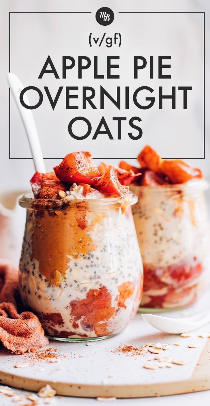 two jars filled with overnight oats sitting on top of a table