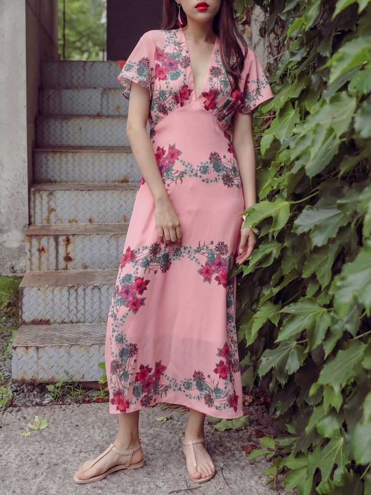 Maxi length V neck dress with short sleeve and pink floral print. Silky satin like material feel. Model is in MINUSEY S. * MINUSEY S = EU 34, US 2* MINUSEY M = EU 36, US 4* 100% Polyester* Dry clean* Made in Korea - Model Height: 170cm/5'7" (US2, EU34) Pink Printed V-neck Midi Dress, Feminine Pink Floral Print Midi Dress, Pink Floral Print V-neck Maxi Dress, Pink Rose Print Midi Dress For Summer, Summer Pink Rose Print Midi Dress, Feminine Floral Print Midi Dress With Short Sleeves, Feminine Printed Short-sleeve Dresses, Feminine Printed Short Sleeve Dress, Feminine Pink Printed Floral Dress