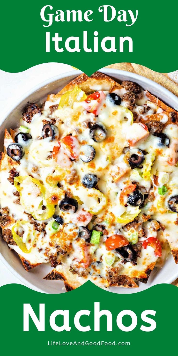 a pizza with black olives, peppers and cheese on it next to the words game day italian nachos