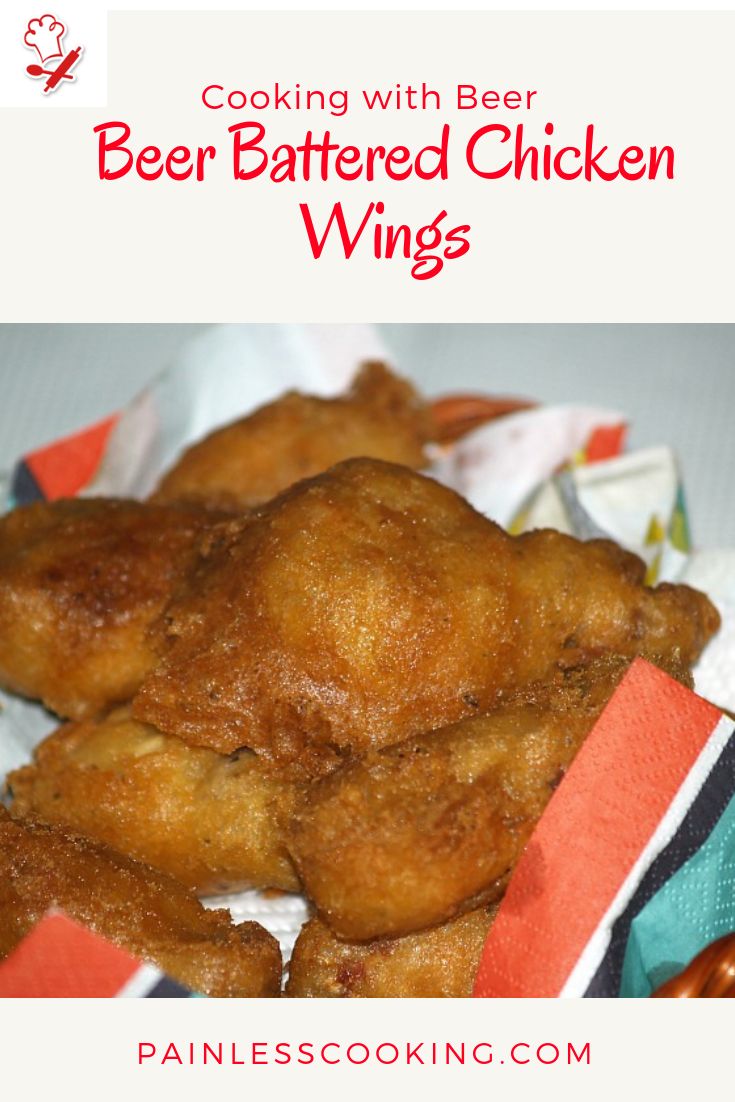 some fried chicken wings sitting on top of napkins with the title cooking with beer beer battered chicken wings