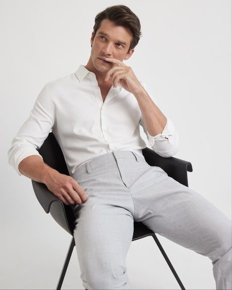 This slim fit performance dress shirt features a knit-feel fabric, making it the perfect piece to make your outfit for the office or for a special occasion, all while maintaining its shape and feel after it's washed.

- Slim fit through the chest and waist
- Regular collar
- Stretch knit fabric
- Long sleeves with buttoned cuffs
- Sleeve length from centre back: 35.5'' (size M) Printed Dress Shirts, Slim Fit Dress, Slim Fit Dress Shirts, Performance Dresses, Clothing Men, Fitted Dress Shirts, Fabric Making, Slim Fit Dresses, Fit Dress