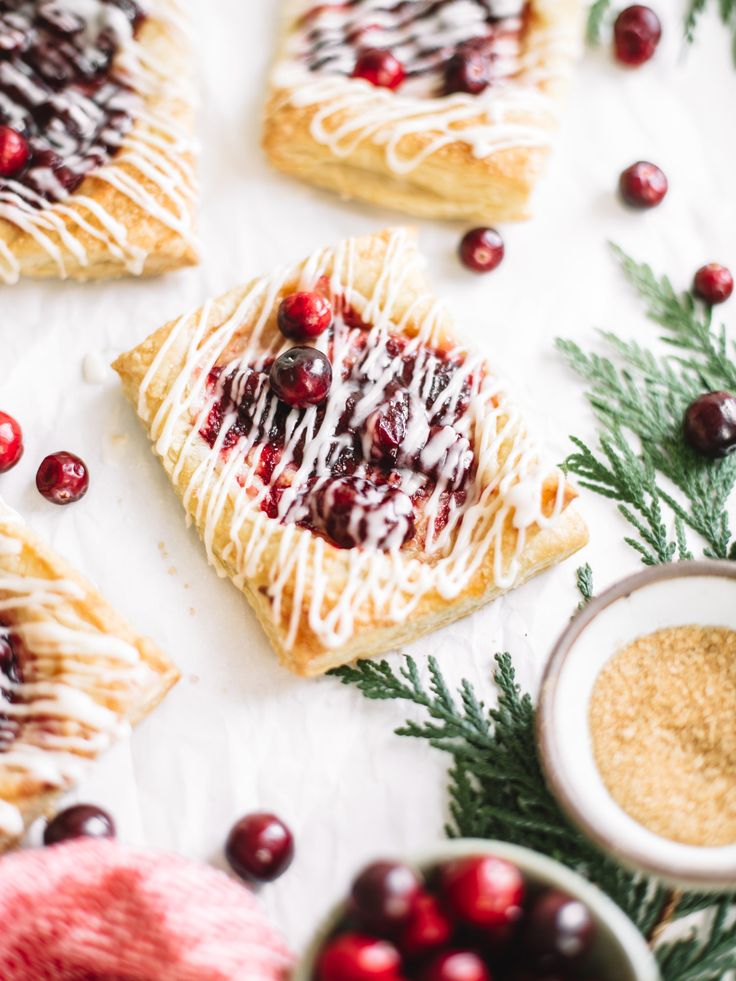 cranberry tarts with white icing and sprinkles