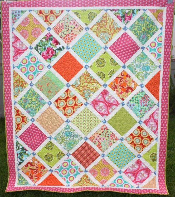 an image of a quilt made with many different colors