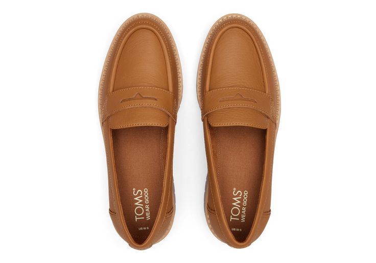 This slip-on shoe offers a modern take on the lug sole loafer trend. Inspired by the comfort of our bestselling boots, the must-have Cara features stylish leather uppers and a silhouette that looks great with jeans, skirts, dresses, and more. Look good, feel good, and do a whole lot of good. WEAR TOMS. WEAR GOOD. | Leather upper. TOMS leather products support responsible manufacturing via the Leather Working Group. Cushioned and durable EVA midsole. Custom CloudBound™ insoles for all-day comfort Womens Leather Slip On Shoes, Business Professional Shoes For Women, Casual Office Slip-ons With Lug Sole, Casual Platform Loafers For Work, Fall Slip-ons For Workwear, Medium Width, Casual Platform Loafers With Lug Sole For Business Casual, Casual Slip-on Platform Loafers For Work, Casual Medium Width Platform Loafers For Work, Modern Slip-ons With Rubber Sole For Fall