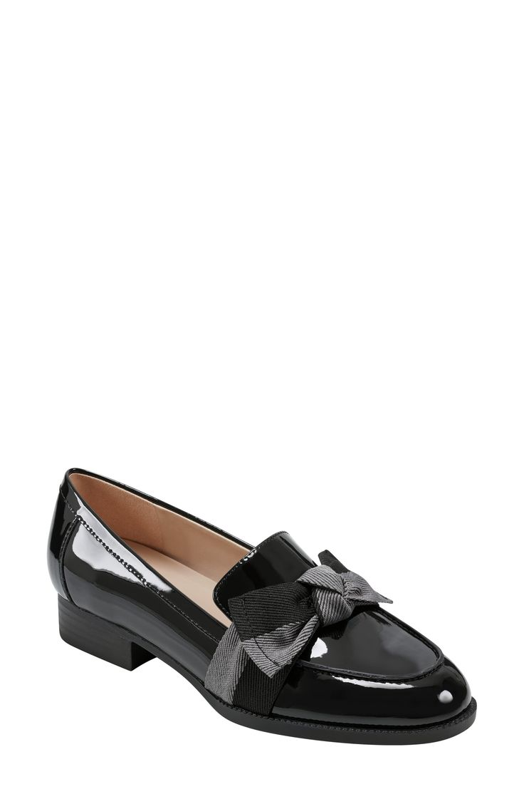 A sophisticated bow details the vamp of a slip-on loafer for a casual chic attire. Sizing: True to size. M=standard width. 1" heel Round apron toe Bow detail Slip-on Synthetic upper, manmade sole Imported Chic Formal Slip-ons With Low Heel, Elegant Formal Flats For Fall, Elegant Fall Formal Flats, Elegant Formal Fall Flats, Spring Formal Patent Leather Loafers, Elegant Black Slip-ons For Spring, Chic Formal Flats For Fall, Chic Patent Leather Low Heel Loafers, Chic Patent Leather Loafers With Low Heel