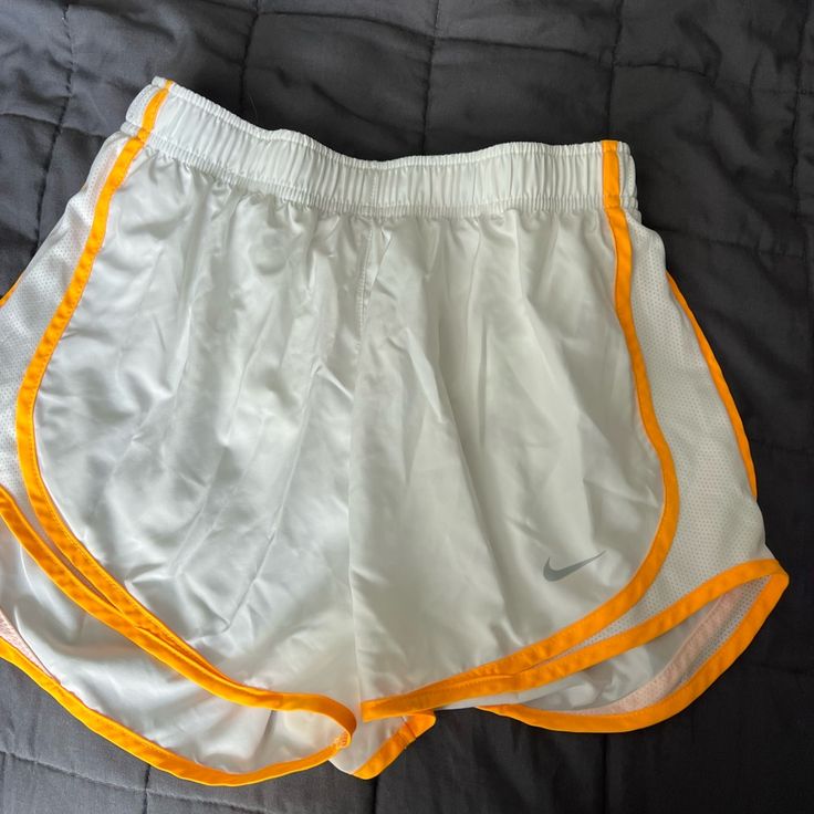 Never Worn White Nike Athletic Shorts For Summer, White Sports Shorts For Spring, White Summer Athletic Shorts For Beach, White Sporty Shorts For Spring, Nike White Athletic Shorts, White Stretch Athletic Shorts For Summer, White Stretch Summer Athletic Shorts, White Athletic Shorts For Workout In Spring, White Athletic Shorts For Spring Workout