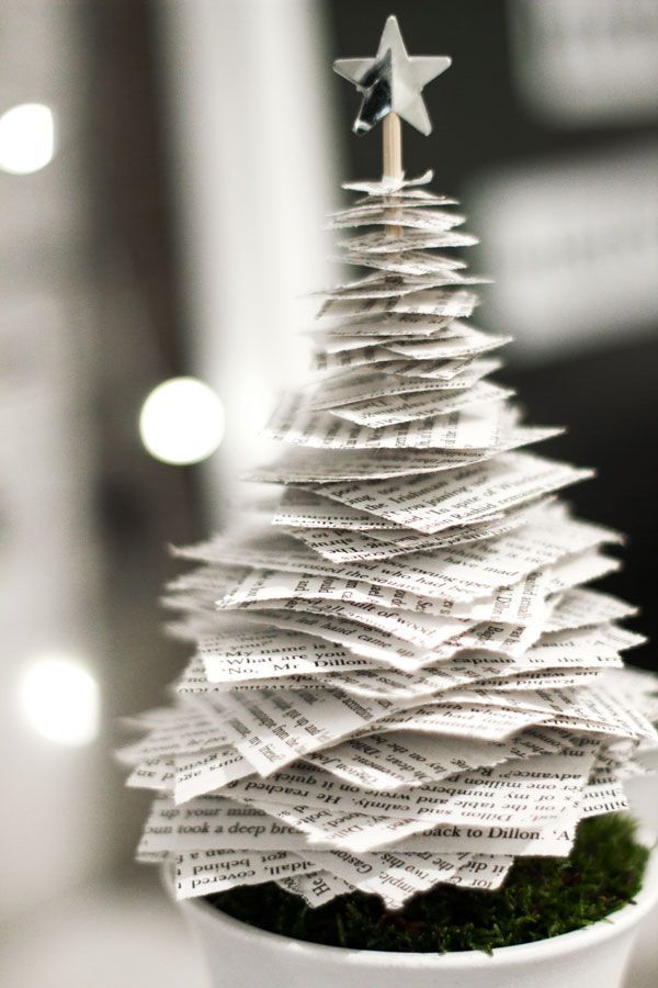 a christmas tree made out of newspaper is shown on the instagram page, and it appears to be fake