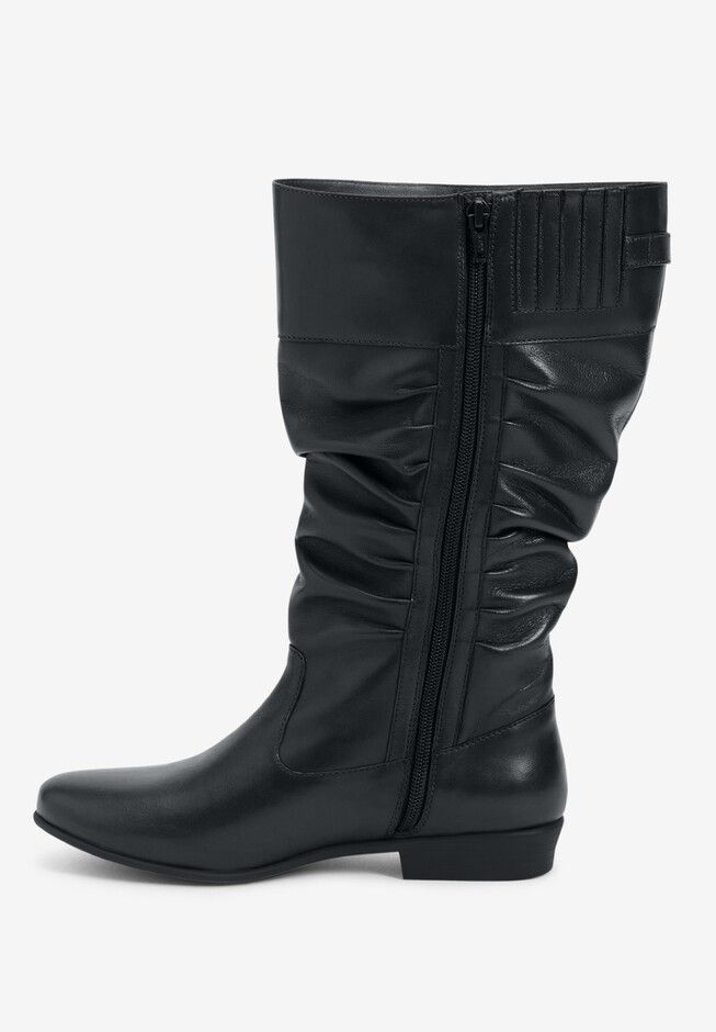 These statement-making Monica tall boots are crafted from smooth leather and designed with a scrunched effect for a chic look. Leather upper                                                                            Inside elastic gore for added comfort.                                                               Full inside zipper for easy on/offPadded insole for added comfort.        Flexible, skid-resistant outsole for a better grip                                     11 1/2" shaft height    Wide calf: 17 3/8"-20 1/4” shaft circumferenceNote: Measurements based on size 7 boot. For each full size larger, circumference increases by 1/2”1” heel height                                                      Leather boots available in full and half sizes 7-11, 12 M; 7-11, 12 W; 7-11, 12 WW Wide Calf Leather Boots, Wide Calf Boots, Swimsuits For All, Wide Calf, Wide Boots, Leather Boot, Calf Boots, Mid Calf Boots, 7 11