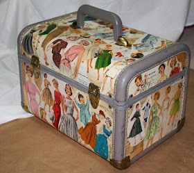 an old fashioned suitcase with many pictures on it