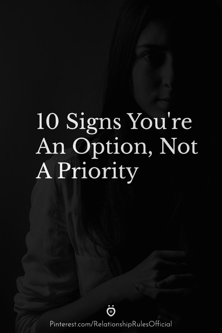 a woman with her arms crossed and the words 10 signs you're an option, not a priority