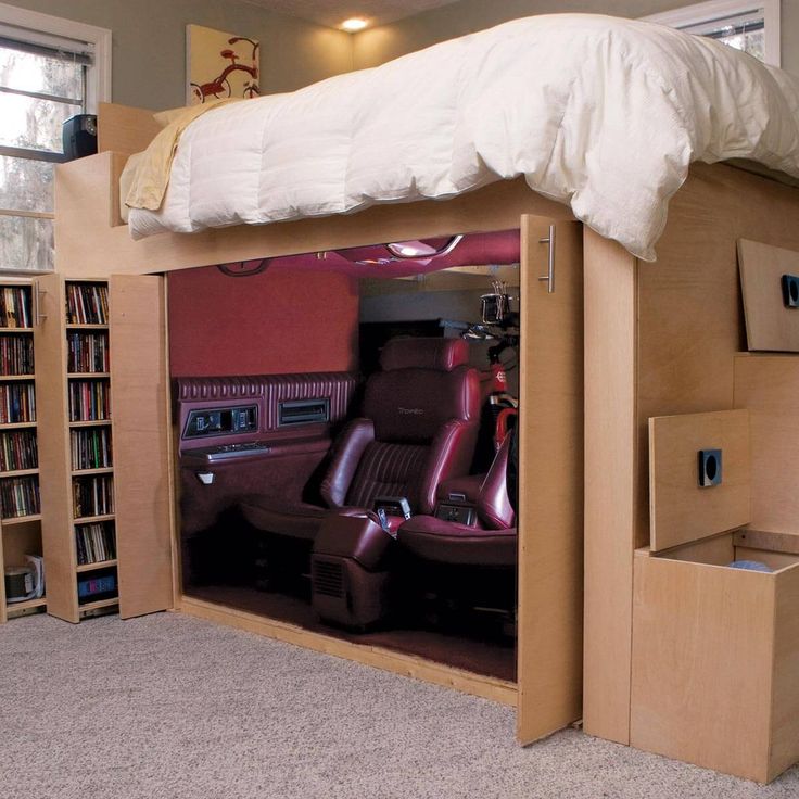 a bedroom with a loft bed made out of cardboard boxes