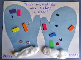 a handmade card with two pairs of feet made out of paper and colored magnets