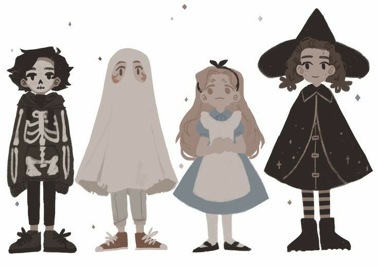 three children in halloween costumes standing next to each other