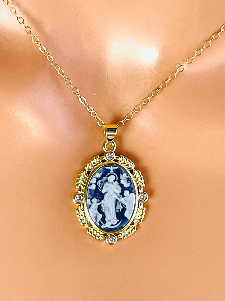 "This is a 14k gold filled Cameo pendant necklace with a beautiful image of Jesus surrounded by angels with the Holy Spirit upon him.  Pendant image is grey ad ivory, measures 30x20mm and comes on a shiny cable chain with spring clasp.  Model is wearing a 16\" length.  Choose your desired length.  Necklace and pendant are 14k gold filled.  Comes in pretty gift box. I do sell a similar Mary cameo on a different listing." Catholic Jewelry Necklace, 14kt Gold Jewelry, St Christopher Pendant, Cameo Pendant Necklace, Clean Sterling Silver, Resin Jewelry Diy, St Christopher, Catholic Jewelry, Length Necklace