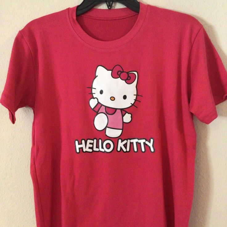 Rose Pink Hello Kitty T-Shirt, Soft Cotton Material Casual Pink Hello Kitty T-shirt, Trendy Cotton T-shirt With Hello Kitty Print, Kawaii Pink T-shirt With Cat Design, Kawaii Pink Cat Design T-shirt, Trendy Pink Hello Kitty T-shirt, Pink Hello Kitty Cotton Top, Trendy Hello Kitty Print Short Sleeve T-shirt, Trendy Short Sleeve Hello Kitty T-shirt, Trendy Short Sleeve T-shirt With Hello Kitty Print