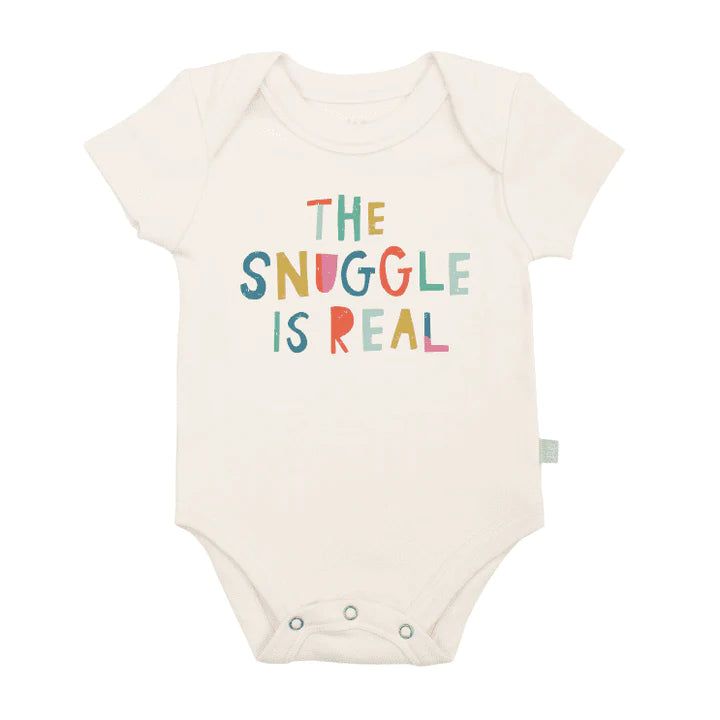 This bodysuit is a reminder to all parents and grandparents that "The snuggle is real". Simple and comfortable is best, especially for babies. This adorable bodysuit is perfect for all sizes and activity levels, from your little one's first day in the world to their first birthday celebration. Made from buttery-soft organic cotton, it features easy-snap fasteners for quick access when changing or bathing. 100% organic cotton G.O.T.S. certified non-toxic, eco-friendly dyes lead/nickel free snaps Painted Onesies, The Snuggle Is Real, Graphic Onesies, Organic Clothes, Child Clothes, Life Is Tough, Baby Vest, Kids Corner, Organic Clothing